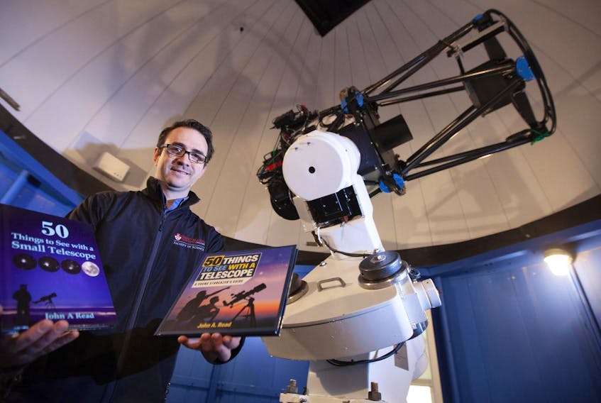 
Author John Read and the Dr. Ralph Medjuck telescope at the observatory at Saint Mary’s University in Halifax. 
