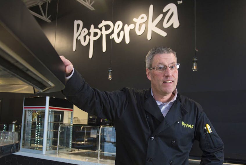 Dean Madill, food services manager with Wilson Fuels, poses for a photo at the new Peppereka restaurant that will open in Burnside Park on Friday. 
