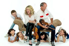 Fiddler Natalie MacMaster is shown with her husband, Donnell Leahy, and five of their seven children.