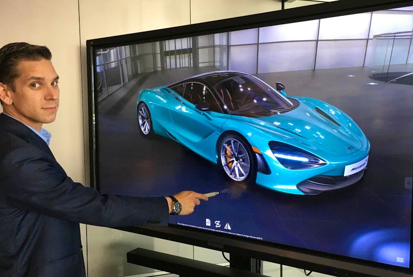 McLaren Toronto’s Mark Basili shows off the McLaren Automotive Real-time Configurator, which offers a glimpse into the future of car shopping.