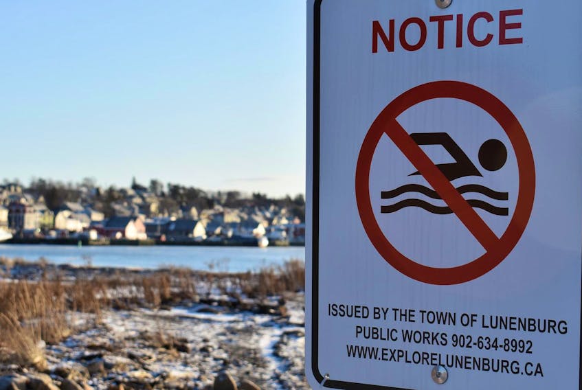 
A sign along the Lunenburg Harbour warns the public against swimming. The Town of Lunenburg recently received a report from the Bluenose Coastal Action Foundation outlining eight recommendations to improve the water quality. (Josh Healey)
