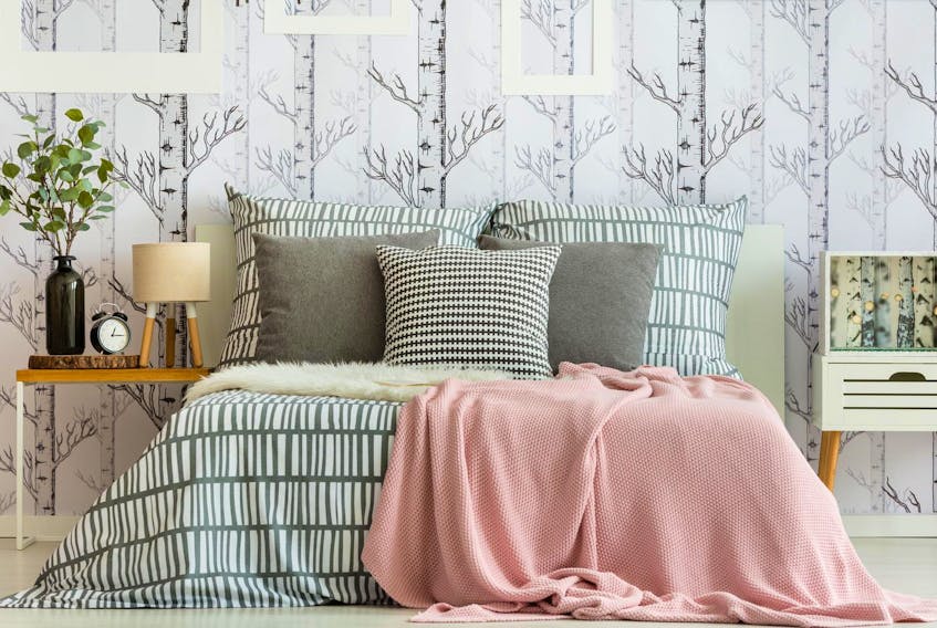 
Wallpaper is still a hot commodity, and if you’re thinking of decorating some walls with, pick a pattern that’s simple and light. If the paper is too bold or dark, the room will look even smaller. - Getty Images/iStockphoto
