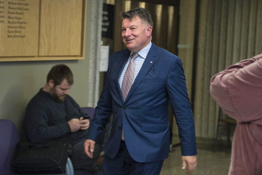 Maurice Chiasson, partner at Stewart McKelvey, walks past the courtroom during a break in court proceedings at Nova Scotia Supreme Court Feb. 5. Cryptocurrency exchange QuadrigaCX, whose CEO died in December, is seeking creditor protection.