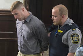 Matthew Albert Percy is led into court June 18, 2018 for the start of his trial on charges of sexually assaulting a woman at his Halifax apartment in September 2017. - Ryan Taplin