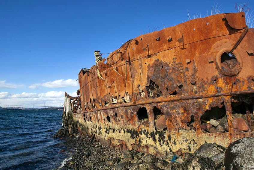 
The SS Daisy embedded into the Dartmouth shoreline. The ship originally built as a trawler for the British Navy has been decaying near the Macdonald Bridge for decades. - Eric Wynne 
