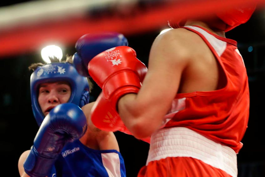 
Halifax’s Alex Bulgaru came away with a silver medal after competing against Quebec’s Sammy Morisset in the boxing final in the 64-kilogram division at the Canada Winter Games on Wednesday night in Red Deer, Alta. - Len Wagg / Communications Nova Scotia
