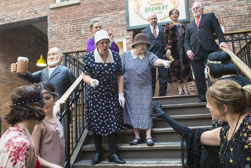 
The cast of Great Harbour: An Immersive Experience runs through a scene at the Alexander Keith’s Brewery on Friday afternoon. The play is set in Halifax during the Prohibition era. It runs Feb. 26 to March 1. 

