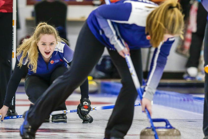 Team Nova Scotia women’s curling skip Cally Moore (Upper Tantallon) shouts instructions to her teammates after delivering a stone in the team’s opening game on Sunday against New Brunswick.