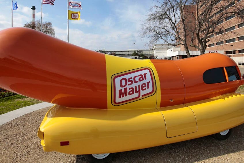 The wienermobile is displayed outside of the the Oscar Meyer headquarters in Madison, Wis., in 2014. Oscar Meyer is owned by Kraft Heinz, which announced a major financial write-down last week. Most of the food conglomerate’s products are traditionally sold in areas of the grocery store now desperate for foot traffic.