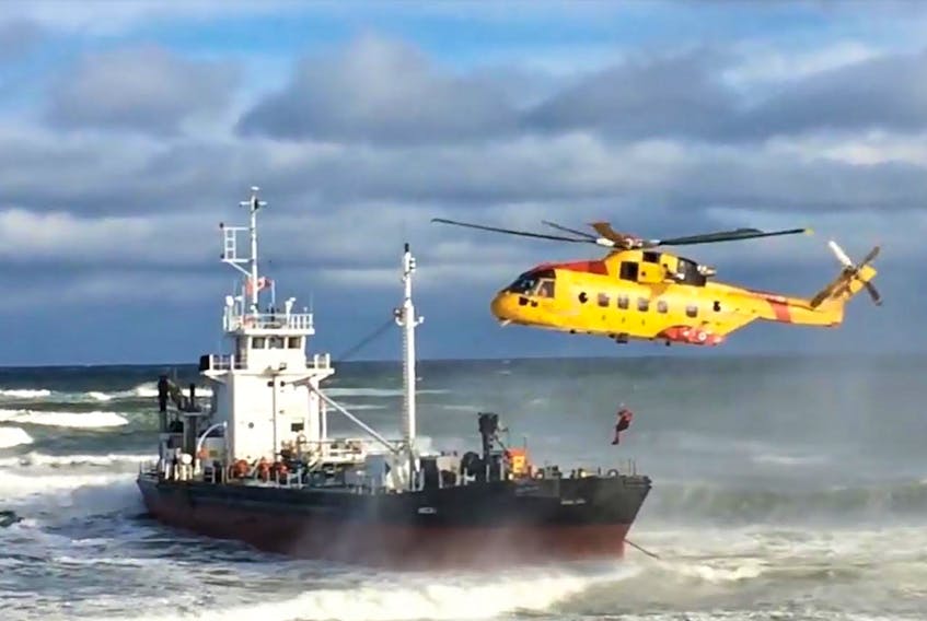 Search and rescue remove crew members from the tanker Arca 1 after it ran aground off Cape Breton last January.