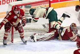
Halifax Mooseheads’ Patrick Kyte trips over Bathurst Titan goaltender Mark Grametbauer late in the first period of a QMJHL game at the Scotiabank Centre on Wednesday. - Eric Wynne
