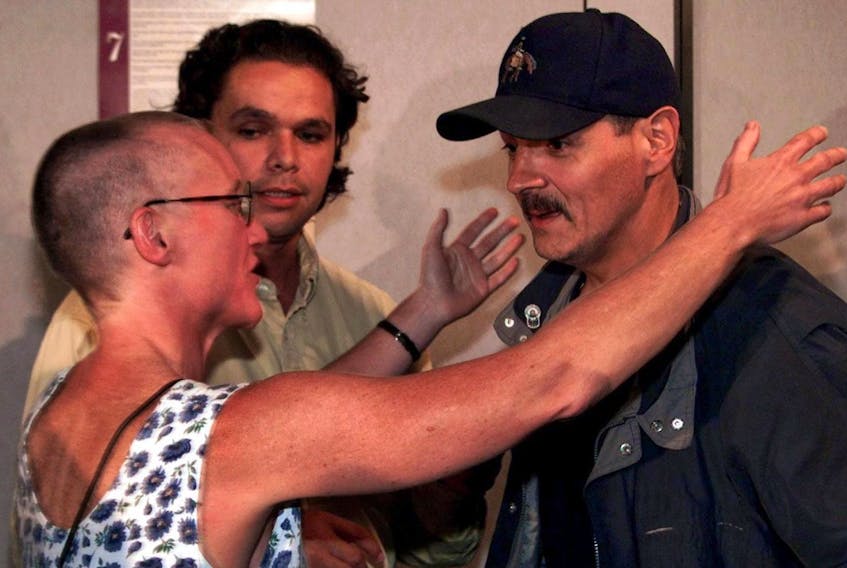Donald Marshall Jr., right, is greeted by lawyer Anne Derrick as Mi’kmaw lawyer Bernd Christmas looks on in September 1999. The Supreme Court of Canada had just upheld a centuries-old treaty and acquitted Marshall on illegal fishing charges. Derrick had represented Marshall in his wrongful murder conviction appeal.