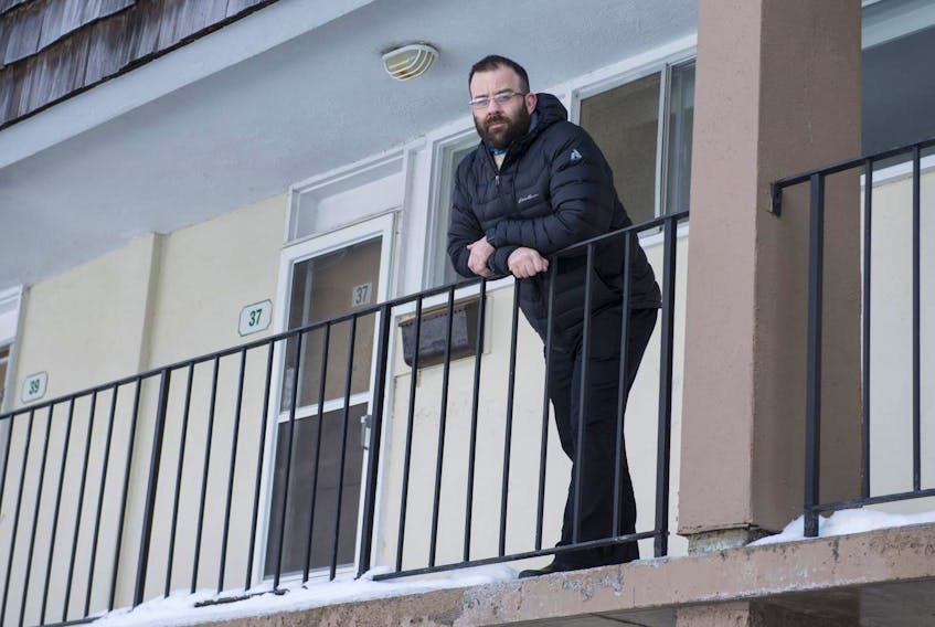
Chris Farnell, outside his Dartmouth apartment on Tuesday, has issues with people smoking outside on the balcony as the smoke often drifts into his kids’ bedrooms. - Ryan Taplin
