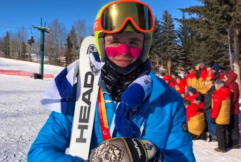 
Shane Sommer has his gold medal around his neck and the Nova Scotia flag draped over his shoulders after winning the male ski cross event at the Canada Games in Red Deer, Alberta on Saturday. (COMMUNICATIONS NOVA SCOTIA)
