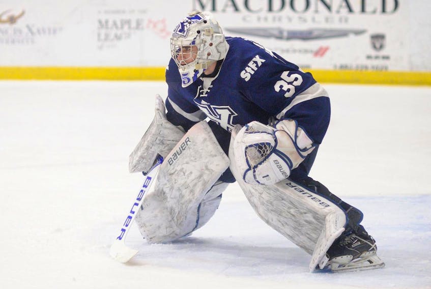 
St. Francis Xavier third-year goalie Chase Marchand singlehandedly backstopped the X-Men to a 2-1 series win over the Acadia Axemen in the conference quarter-finals. - Bryan L Kennedy
