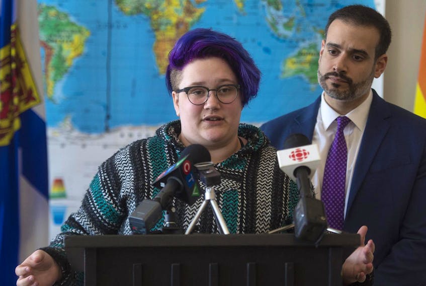 
Hanely Smith, a Grade 11 student and youth board member for the Youth Project, speaks at a news conference at Citadel High as Education Minister Zach Churchill listens on Wednesday morning. The provincial government is spending $750,000 over three years to support the Youth Project, an LGBTQ2+ advocacy group. - Ryan Taplin 
