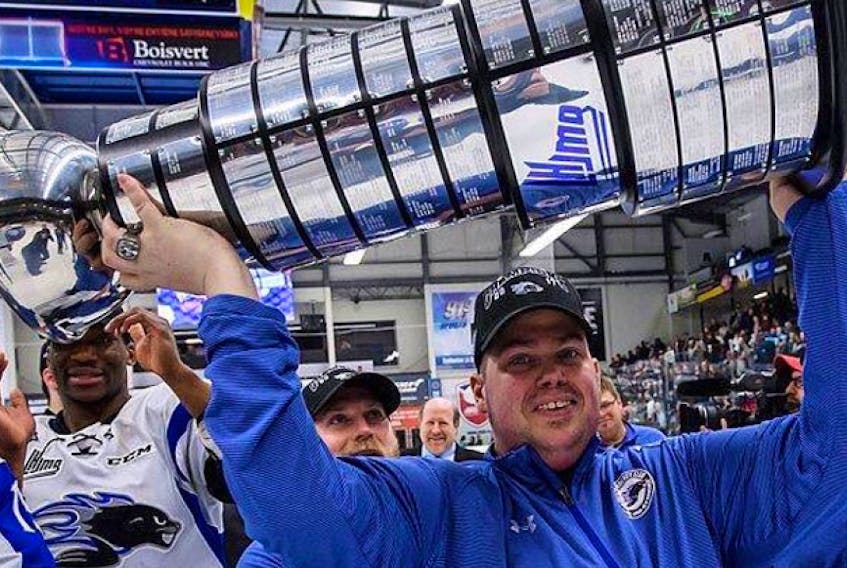 
David Kelly raises the President Cup after the Saint John Sea Dogs won the 2017 QMJHL championship. - Contributed

