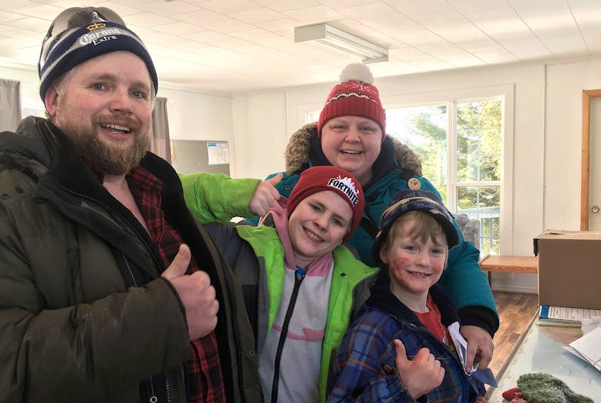 
The McWaid family of Kentville was the first team out of 14 to win the scavenger hunt that concluded the Town of Kentville’s Weekend of Winter celebration on Saturday, March 9. Prizes were awarded to the first 10 teams to complete the mission. From left: Jon, Shane, Angie and Brett McWaid. 
