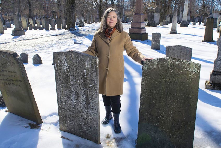 
Filmmaker Johanna Lunn poses for a photo inside the Camp Hill Cemetery on Friday afternoon. Lunn is the creator of the When You Die project, which is dedicated to raising awareness and increasing conversation, about death. 
