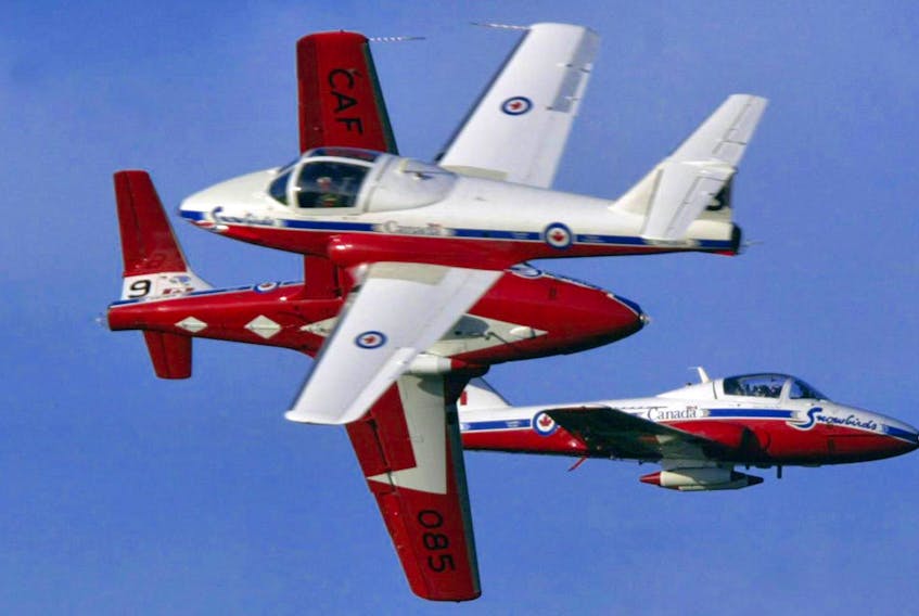 
Three members of Canada's famous Snowbirds perform a close pass during the 2004 Nova Scotia International Air Show. - File
