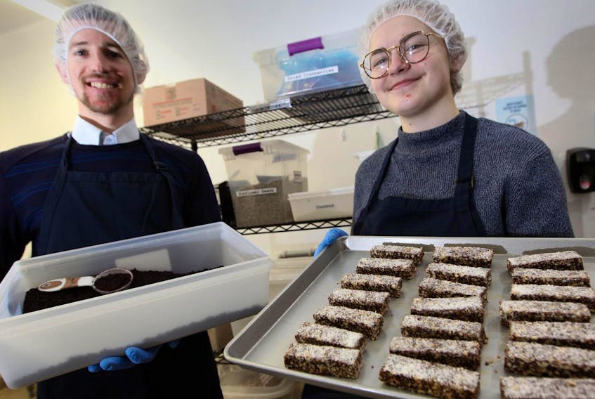 
Bandha Nutrition Products president Ryan DesRoches and operations manager Sarah Johnson display energy bars made in the company’s Halifax facility. The bars are now available in 26 Sobey’s stores, as well as in cafes and health food stores. - Eric Wynne
