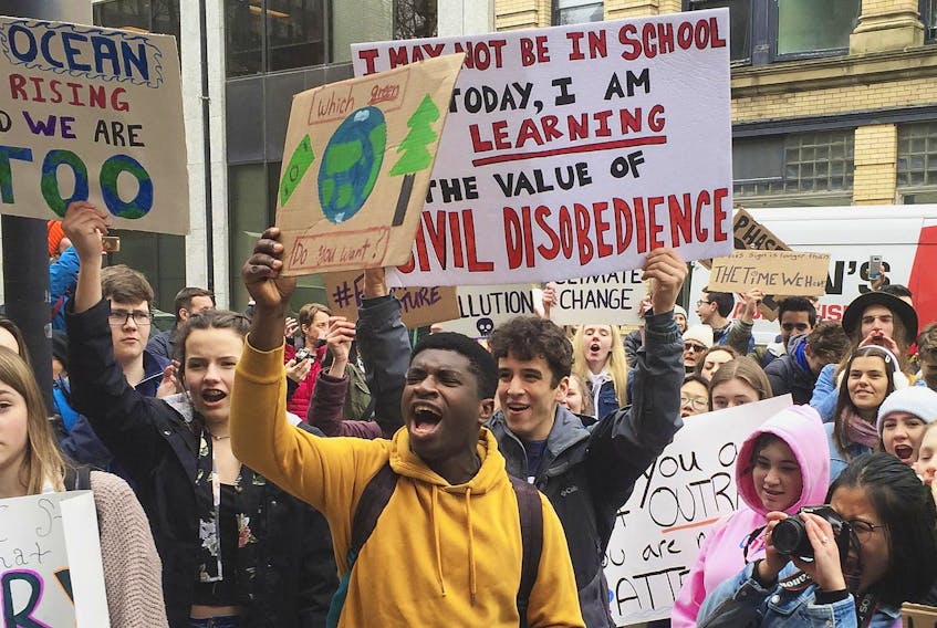 
Hundreds of high school students rally at Province House on Friday to urge government to act on climate change. - Francis Campbell
