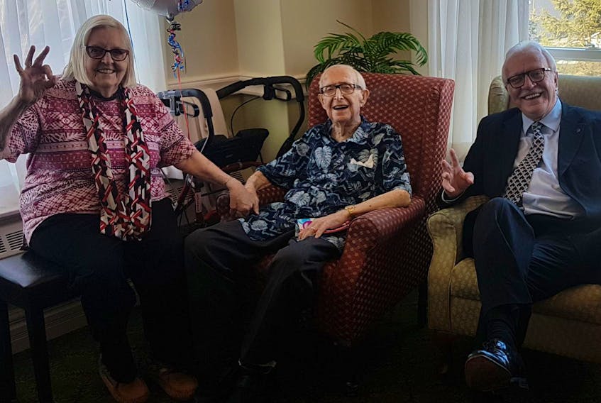 
Charles Frost (centre) recently celebrated his 100th birthday with friends and family at Parkland at the Lakes in Dartmouth. Shown with him are his wife, Sheila Frost, and son, James Frost. - Heidi Frost
