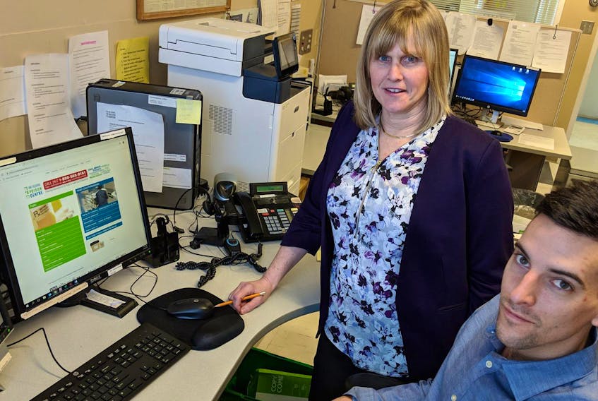 Laurie Mosher, clinical leader of the IWK Regional Poison Centre, and Shawn Smith, a pharmacist specialist in poison information who handles calls from the public, are shown at the centre on Monday.