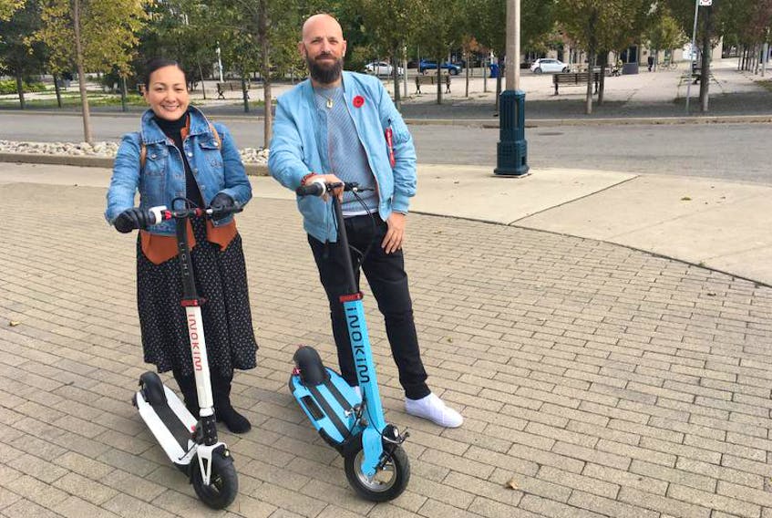 
Diana Pissarouk and Phil Panetta discovered e-scooters while touring around San Diego. - Matt Bubbers 
