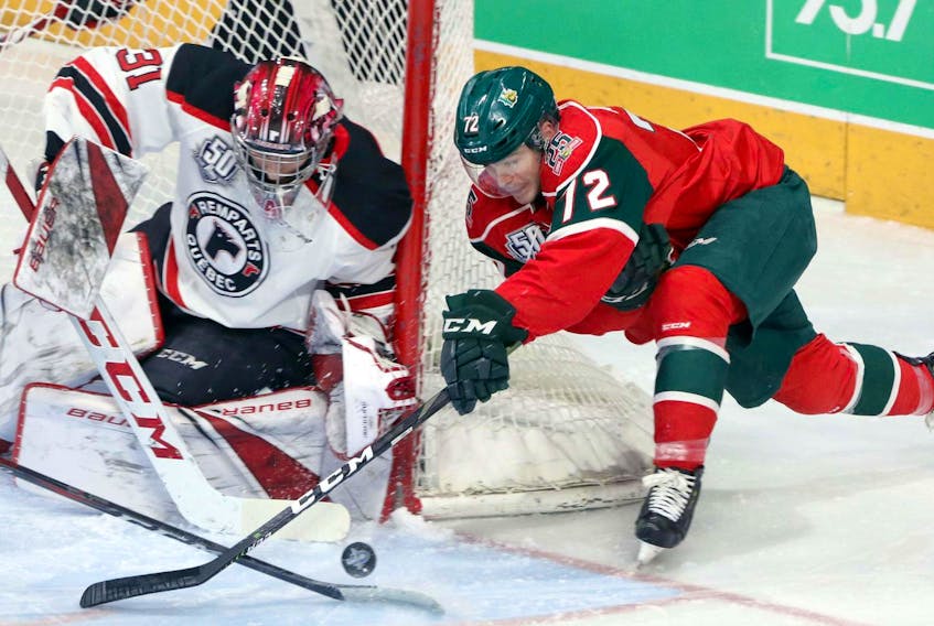Mooseheads’ Sameul Asselin tries the wrap-around against Quebec Remparts’ goaltender Carmine-Anthony Pagliarulo midway through the first period of a QMJHL playoffs game at the Scotiabank Centre in Halifax on Friday.