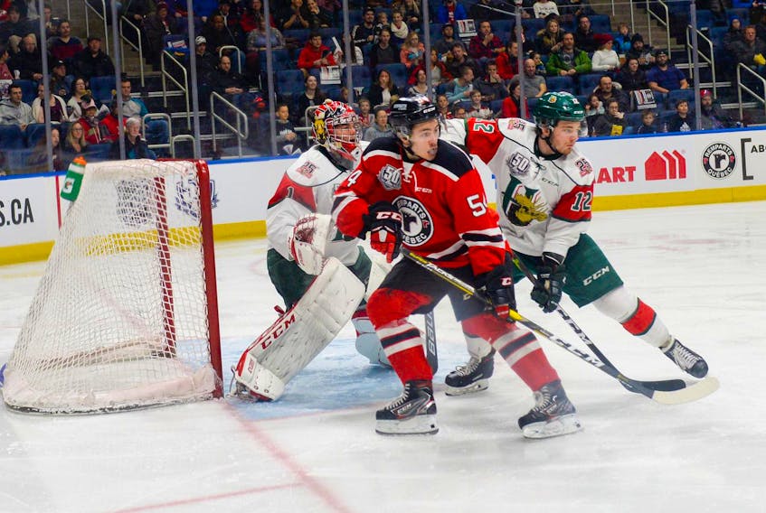 
Halifax Mooseheads defenceman Patty Kyte covers Quebec Remparts forward Samuel Dickner in front of goalie Alexis Gravel during Saturday’s QMJHL playoff game at the Centre Videotron in Quebec City. (Caroline Gregoire/Le Soleil)
