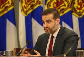 Education and Early Childhood Development Minister Zach Churchill speaks with journalists during a bill briefing in Halifax in 2018.