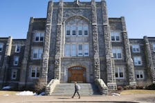 
A student walks past the front of the McNally Building on the campus of Saint Mary’s University in Halifax. - Tim Krochak
