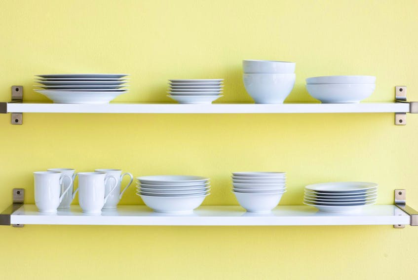 
Before you start shopping, get out your measuring tape. Since dishes come in different shapes and sizes, your cabinets must be able to comfortably fit them. Getty Images/iStockphoto
