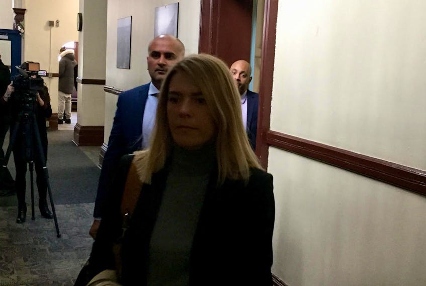 
Bassam Al-Rawi walks behind his wife Thursday as they enter Halifax provincial court for Day 9 of his sexual assault trial. - Steve Bruce
