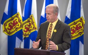 
Justice Minister Mark Furey announces a moratorium on street checks during a news conference on Wednesday. 
