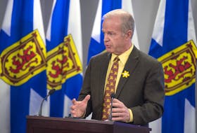 
Justice Minister Mark Furey announces a moratorium on street checks during a news conference on Wednesday. 
