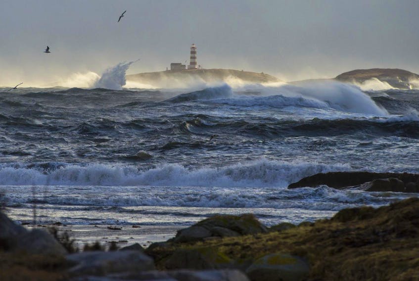
Sambro Island Lighthouse is seen as a January 2018 storm whips the waves. - Ryan Taplin

