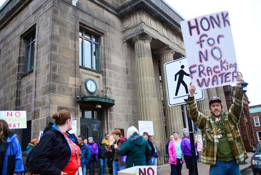 In this file photo, Paul Farrow and some 50 other protestors picketed the Amherst Town Council building over the town’s then proposal to dispose of treated fracking water through its waste water system.