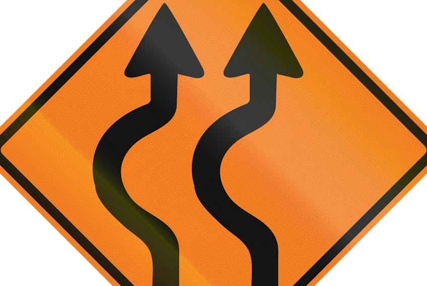 Canadian traffic warning sign - Double two reverse curve to the left. This sign is used in Ontario.
