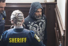 
Troy Edward William Clayton is led into Halifax provincial court Thursday for an appearance on a charge of second-degree murder in the 2017 death of Benjamin Lokeny. - Ryan Taplin
