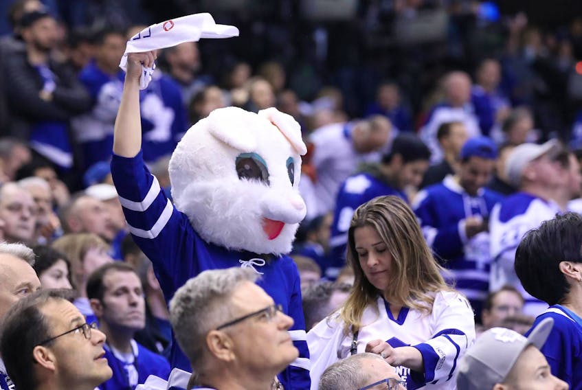 
A Toronto Maple Leafs fan waves a towel while dressed as the Easter bunny during game six of the first round of the 2019 Stanley Cup Playoffs against the Boston Bruins at Scotiabank Arena. - Tom Szczerbowski/Reuters
