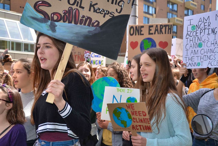 
Hundreds of high school students marched in downtown Halifax on Friday afternoon to protest government inaction on climate change. - Francis Campbell
