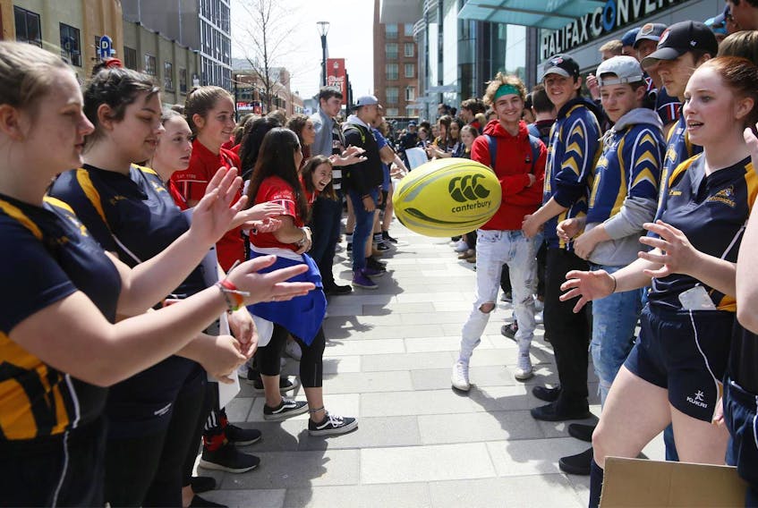 
High school rugby players rally outside the Nova Centre in Halifax Friday to save their sport. -Tim Krochak
