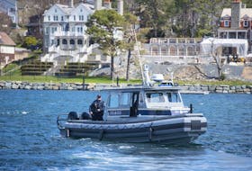 
The MV Bob Annand, a rigid-hulled inflatable boat, is launched into the Northwest Arm following a ceremony at the Royal Nova Scotia Yacht Squadron on Wednesday. - Ryan Taplin 

