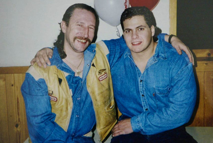 Sean Simmons, right, was killed in 2000, and Hells Angels member Neil Smith, left, is one of the men serving a life sentence for having a role in the slaying. - Herald file
