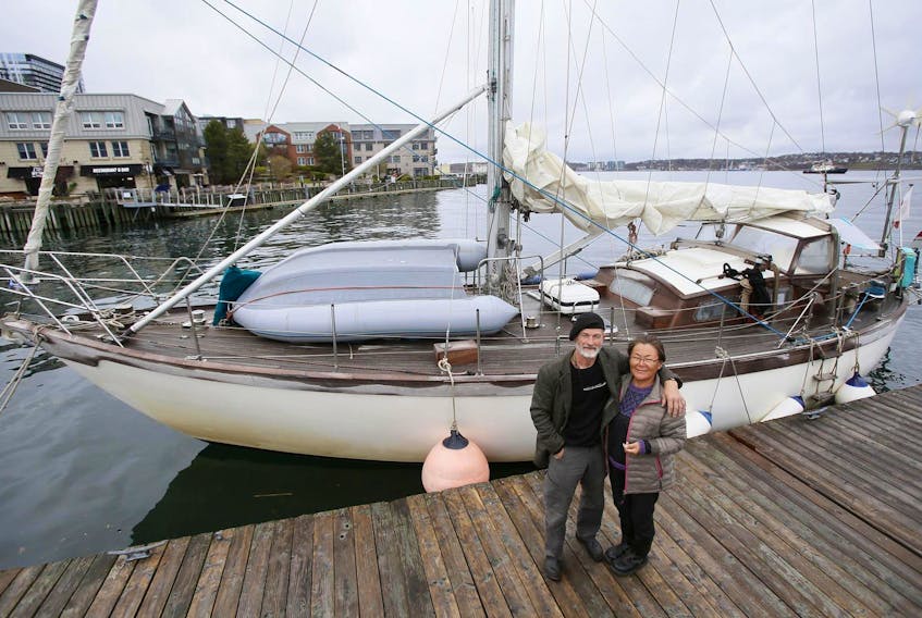 

Jens Erik Kjeldsen and his wife, Dorte, are seen in front of their boat, Kigdlua, on the Halifax waterfront on Wednesday. The couple, who have been sailing around the world for the last two years, are scratching their heads at what they claim was shabby treatment by Canadian border service officials. - Tim Krochak
