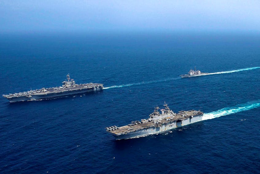 
Abraham Lincoln Carrier Strike Group (ABECSG) and Kearsarge Amphibious Ready Group (KSGARG) conduct joint operations in the U.S. 5th Fleet area of operations in the Arabian Sea on May 17.
