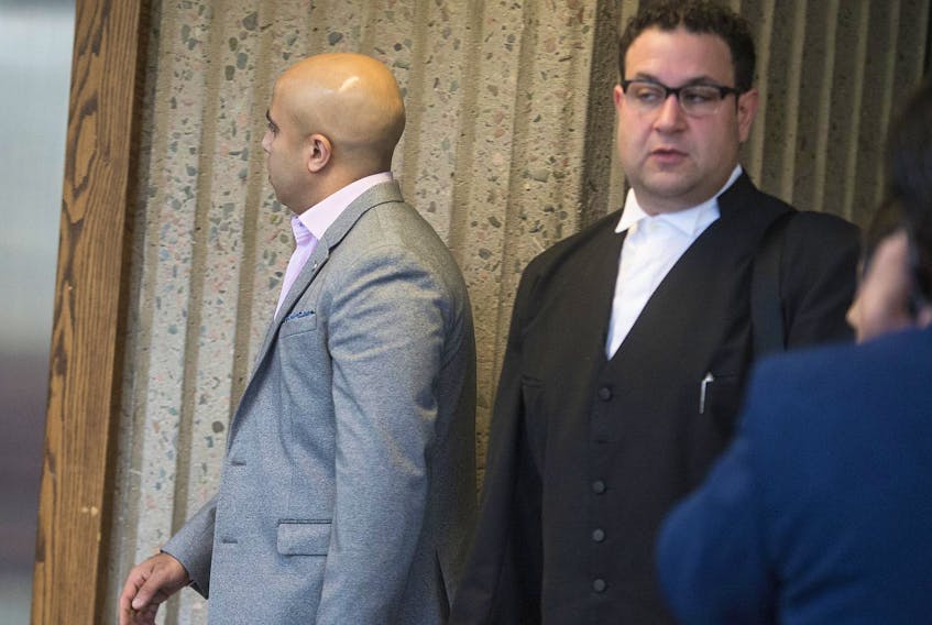 Mostafa M.Y. Hussien leaves court with lawyer Rame Katrib during a break at his sentencing hearing on charges of sexually assaulting and forcibly confining a Halifax hotel employee in February 2016.