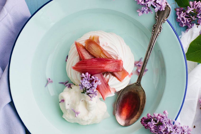 Poaching rhubarb in Nova Scotia white wine or hard apple cider is a match made in heaven, especially when served on top of a meringue nest with dollops of fluffy whipped cream.